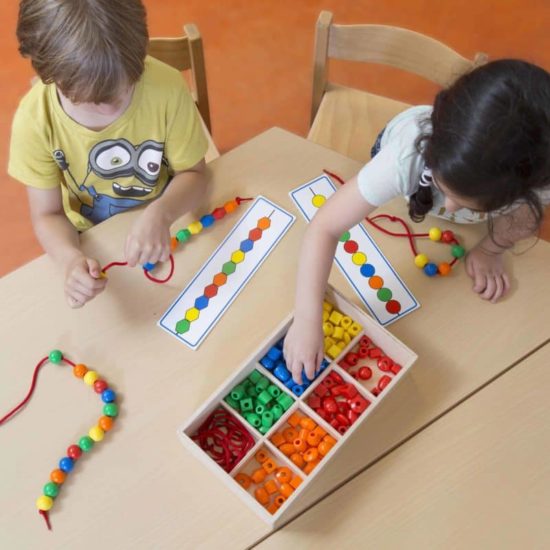 Educo maxi stringing beads is educational material for the child to create patterns with beads, whilst differentiating shape, colour and order